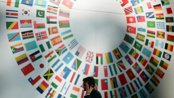 Flags at the World Bank illustrating an article with viewpoints from Boston Consulting Group, or BCG, on how generative AI is reshaping global competition and geopolitics, presenting challenges and opportunities for nations and businesses alike.